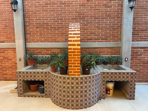 Área de servicio con lavaderos de talavera, junto a la cocina